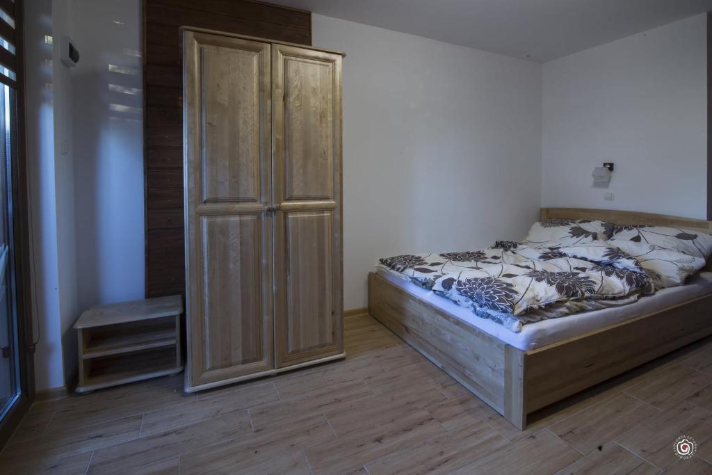 Postel nebo postele na pokoji v ubytování Domek Na Fali