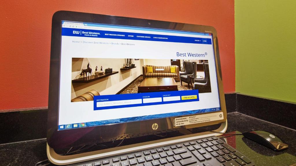 TV a/nebo společenská místnost v ubytování Best Western Executive Inn