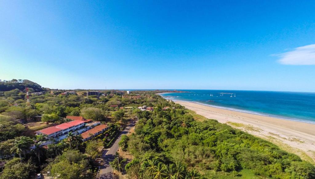 an aerial view of a beach and the ocean at Best Western Tamarindo Vista Villas in Tamarindo