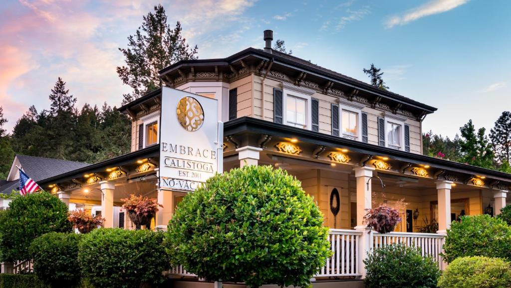 a large house with a sign in front of it at Embrace Calistoga in Calistoga