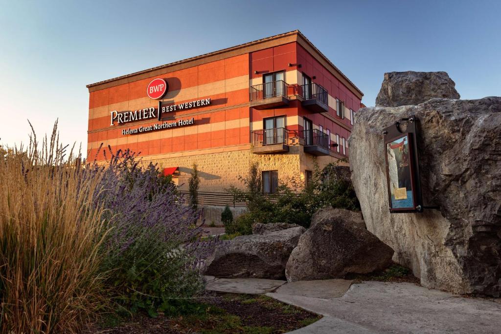 a building with a rock in front of it at Best Western Premier Helena Great Northern Hotel in Helena