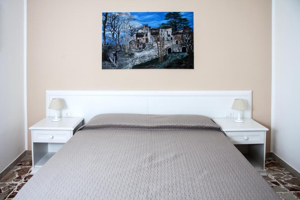Postel nebo postele na pokoji v ubytování BFRAME Cornice Barocca