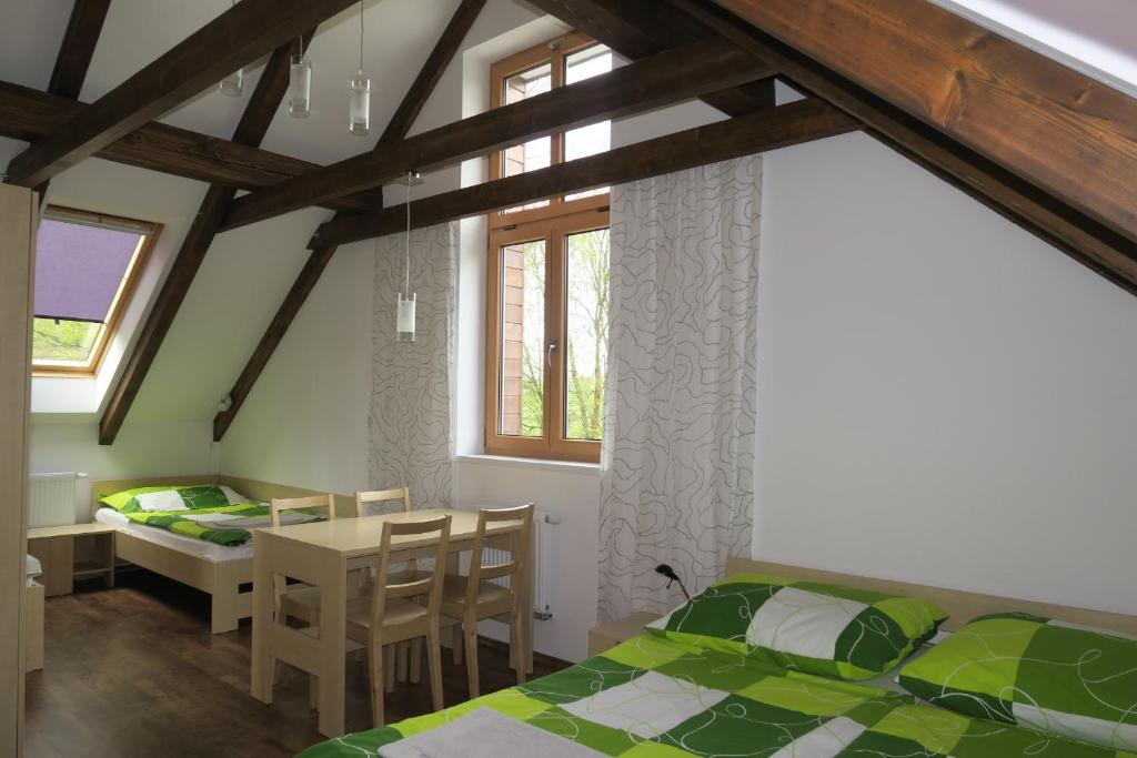 Postel nebo postele na pokoji v ubytování Penzion Na Pohoři