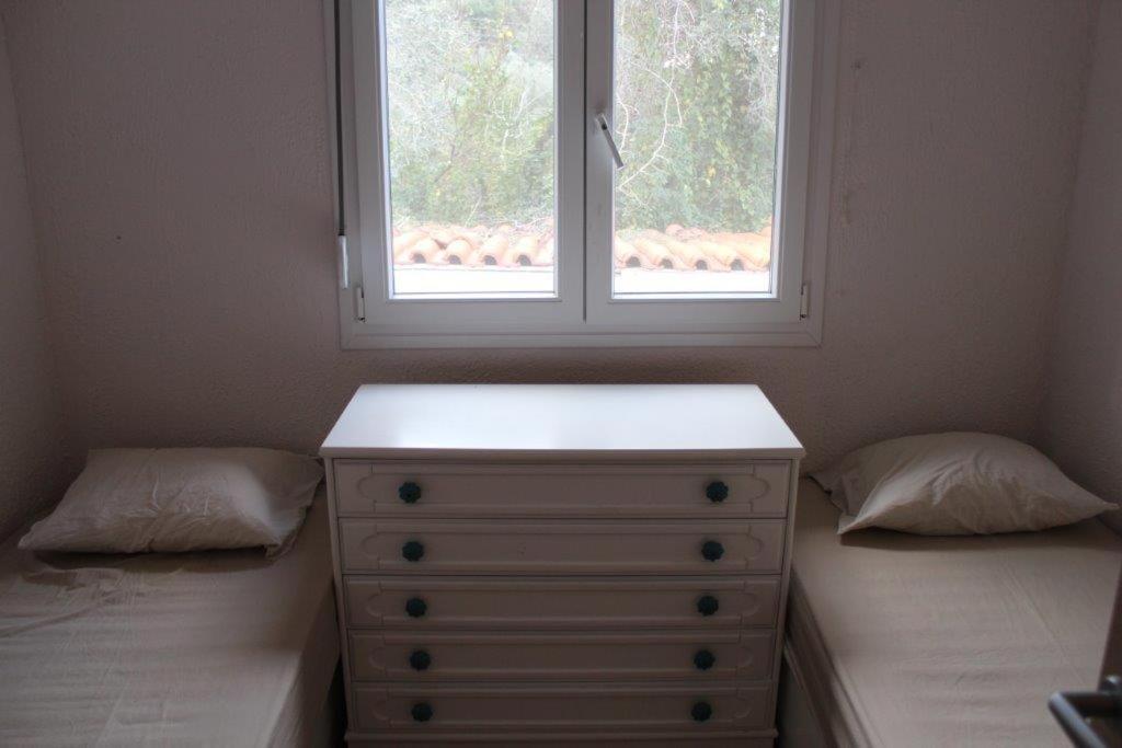 A bed or beds in a room at Sea View Villa by Agora