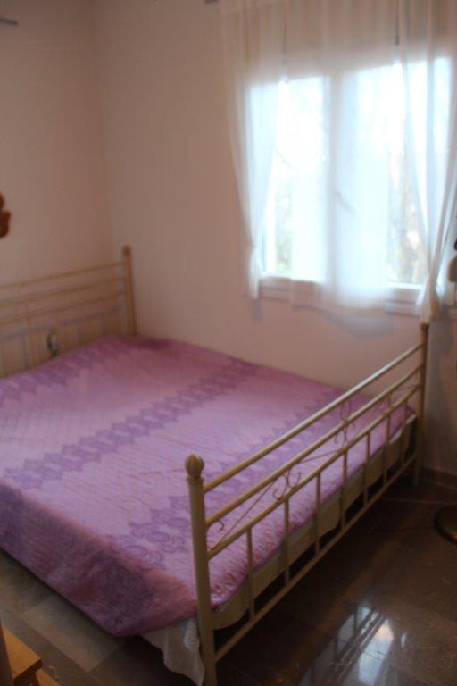 A bed or beds in a room at Sea View Villa by Agora