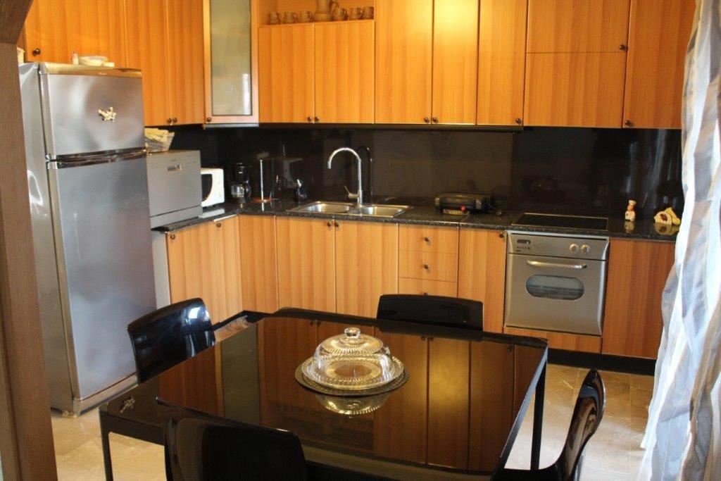 A kitchen or kitchenette at Sea View Villa by Agora