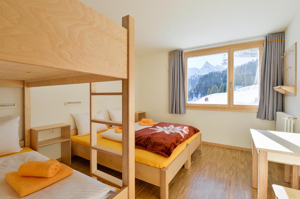 Rúm í herbergi á Haus Matschwitz
