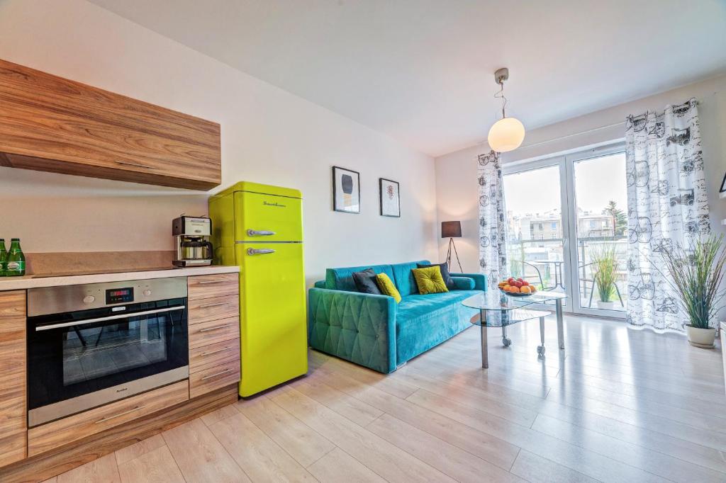 Kuchyňa alebo kuchynka v ubytovaní Apartamenty Homely Place Koziołki - Stary Rynek - Parking