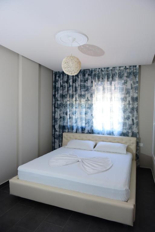 Postel nebo postele na pokoji v ubytování Villamaria Hotel