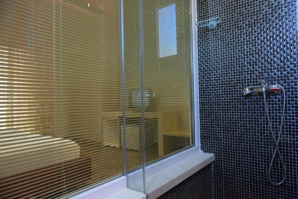 Koupelna v ubytování Villamaria Hotel