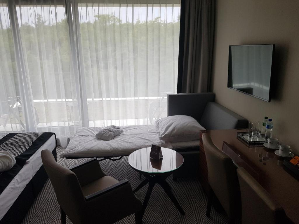 Posedenie v ubytovaní Apartament prywatny 329 w Diune Resort