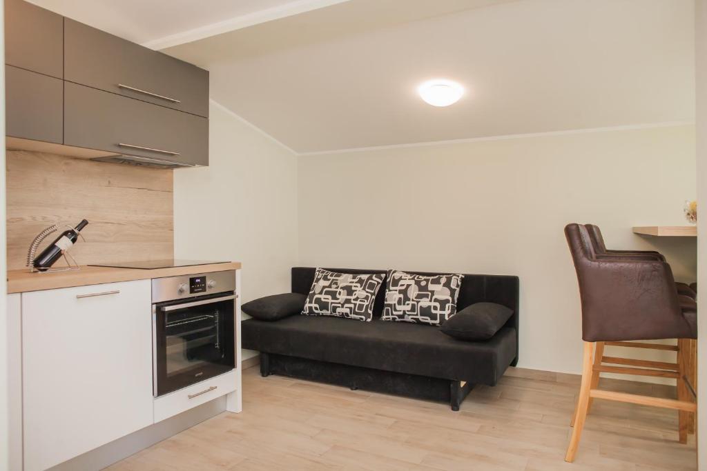Kuchyň nebo kuchyňský kout v ubytování Apartments Villa Matea