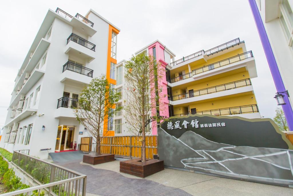 an apartment building with a skate ramp in front of it at Ting Feng Cottage in Yuanshan