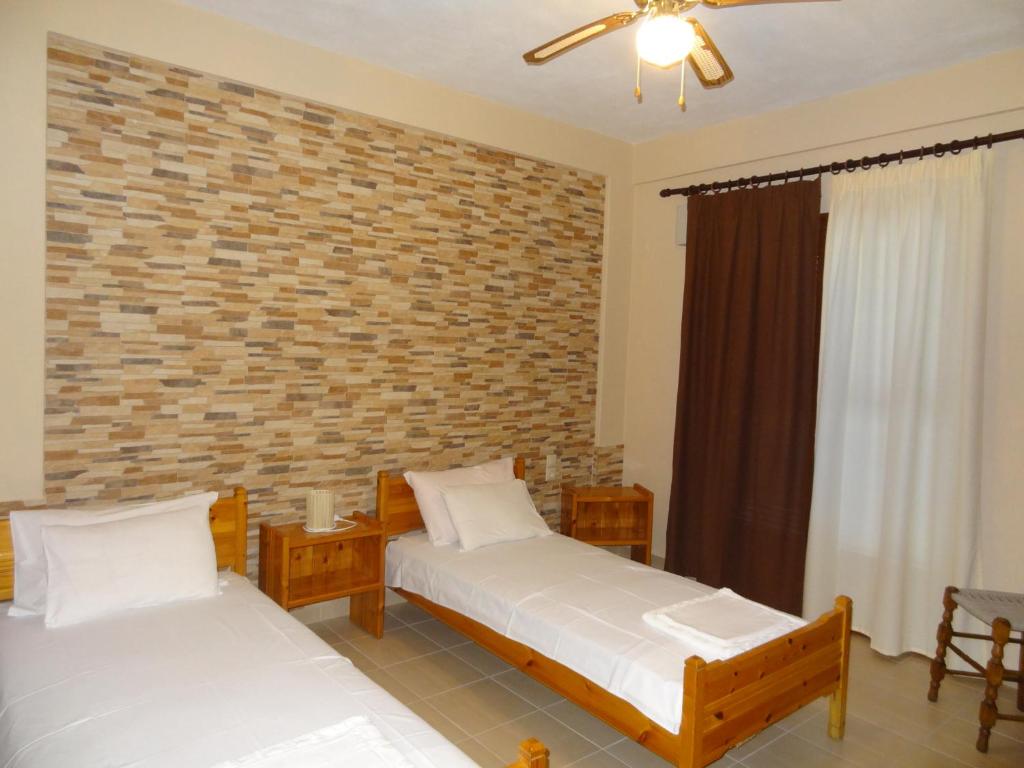 Postel nebo postele na pokoji v ubytování Germanis House