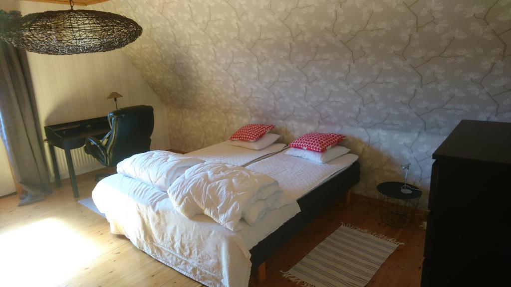 Postel nebo postele na pokoji v ubytování Torp Källtorp B&B