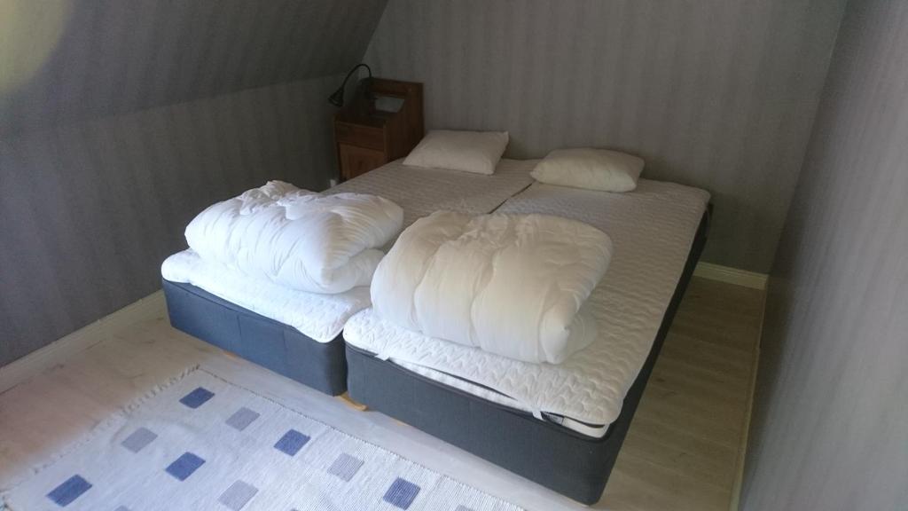 Postel nebo postele na pokoji v ubytování Torp Källtorp B&B