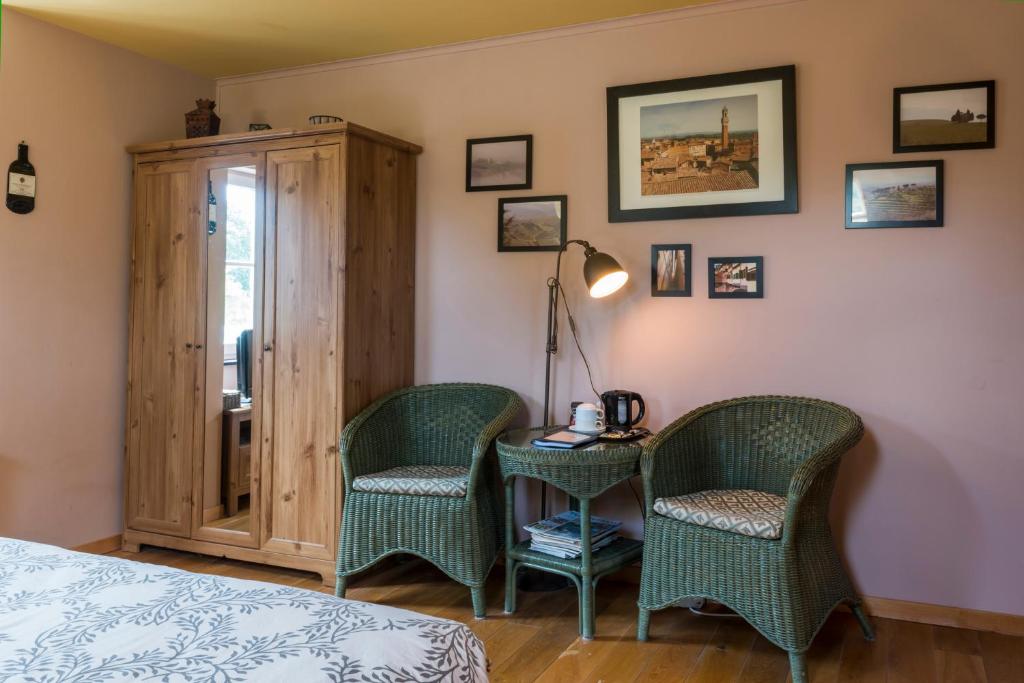 Postel nebo postele na pokoji v ubytování B&B La Clé du Sud