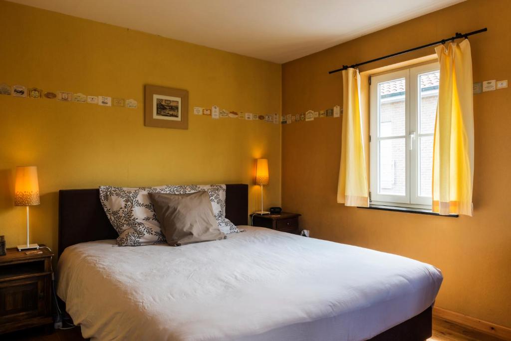 Postel nebo postele na pokoji v ubytování B&B La Clé du Sud