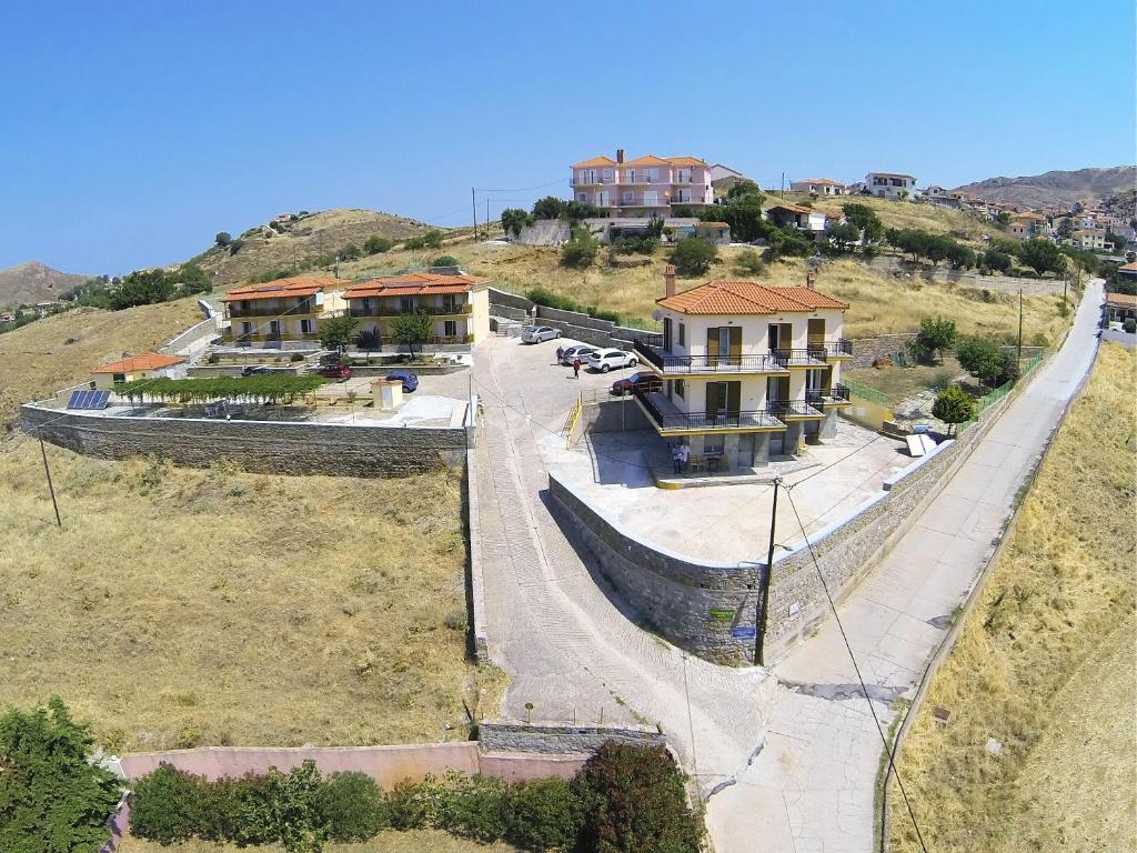 an aerial view of a house on a hill at Panorama Plati in Platy