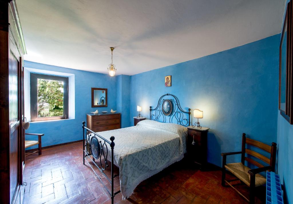 Postel nebo postele na pokoji v ubytování Casa Boschetto