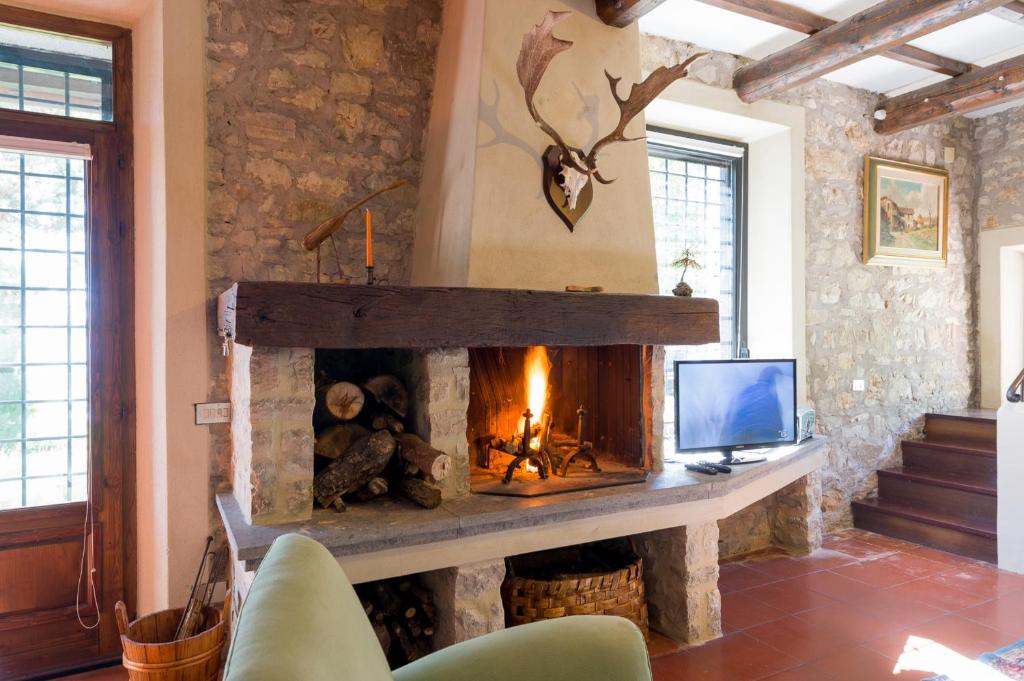 TV a/nebo společenská místnost v ubytování Casa Boschetto