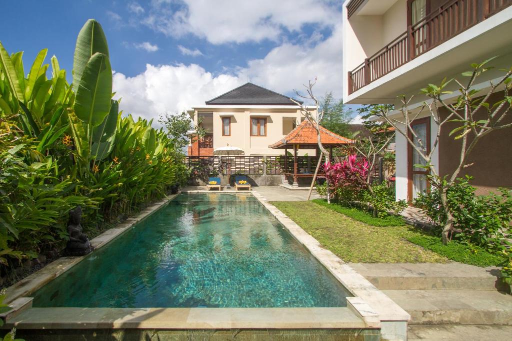 Bazén v ubytování Pondok Massas Ubud nebo v jeho okolí