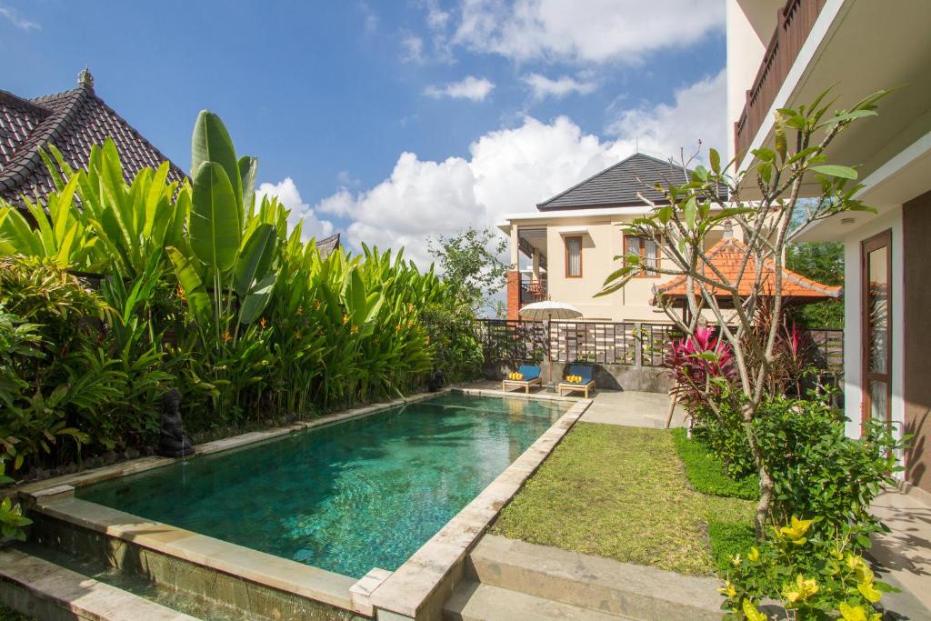 Bazén v ubytování Pondok Massas Ubud nebo v jeho okolí
