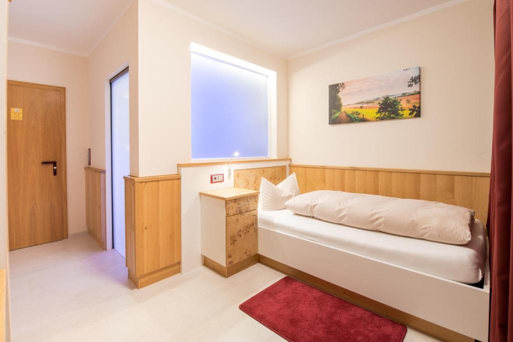 Postel nebo postele na pokoji v ubytování Hotel Luisen Mühle