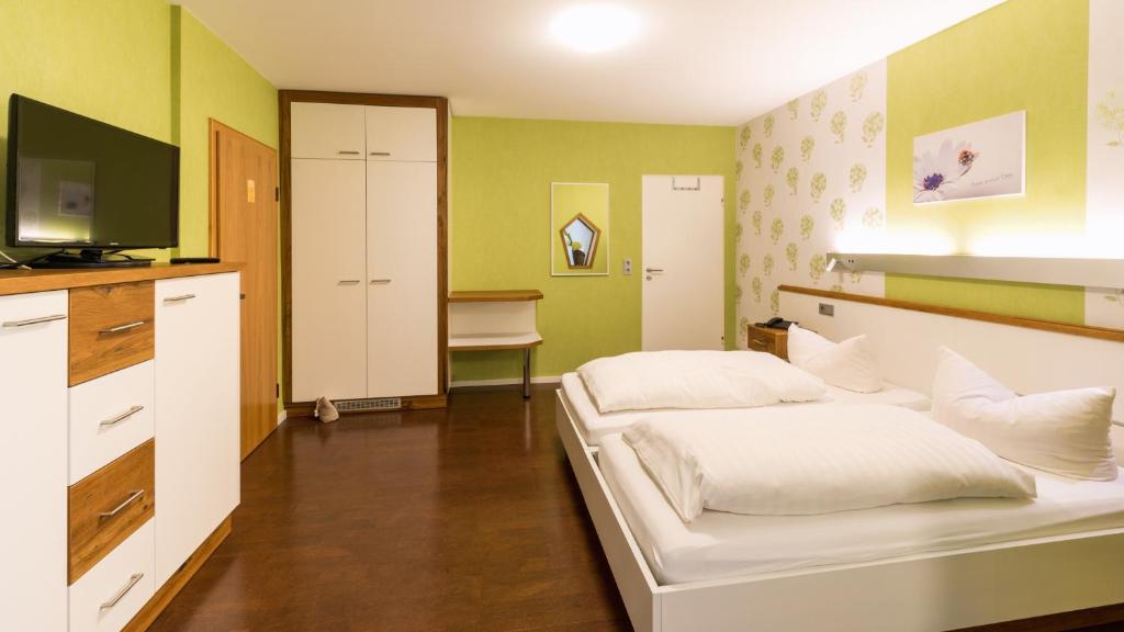 TV a/nebo společenská místnost v ubytování Hotel Luisen Mühle