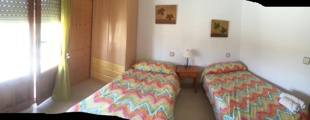 Postel nebo postele na pokoji v ubytování Apartamento González Montsec Montrebei
