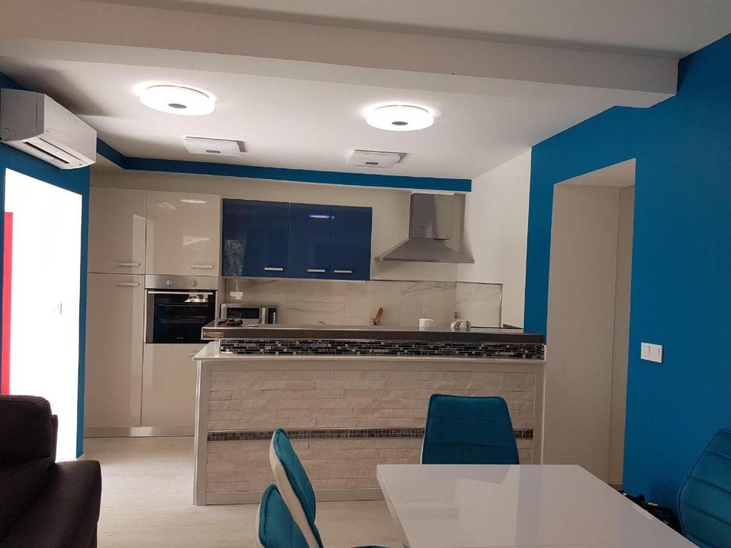 Kuchyň nebo kuchyňský kout v ubytování Villa Drinka Apartments