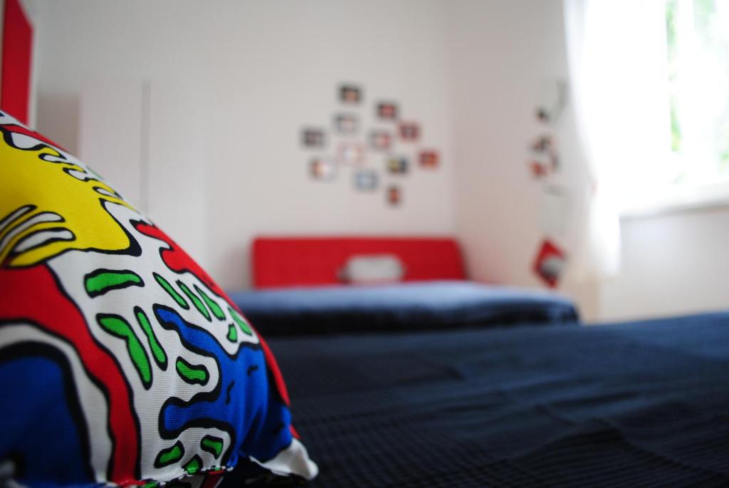 Postel nebo postele na pokoji v ubytování Stazione22 B&B