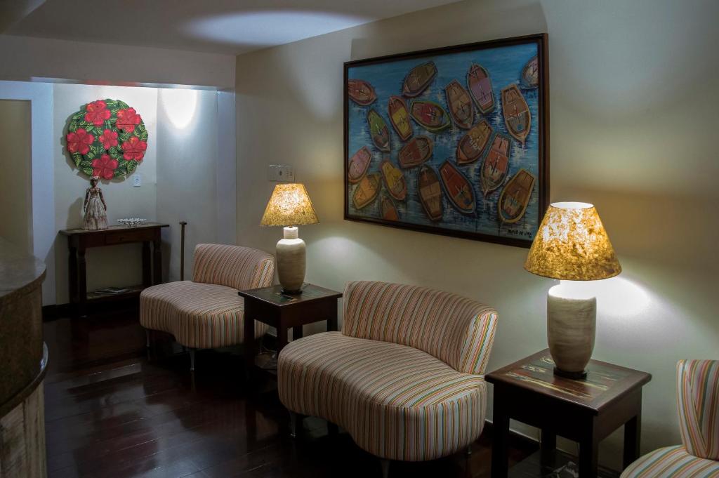 Uma área de estar em Palace Hotel