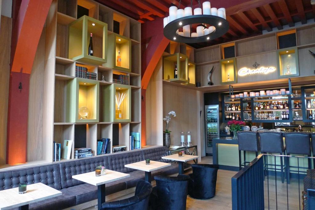 Restaurace v ubytování Boutique Hotel Steenhof Suites - Adults Only