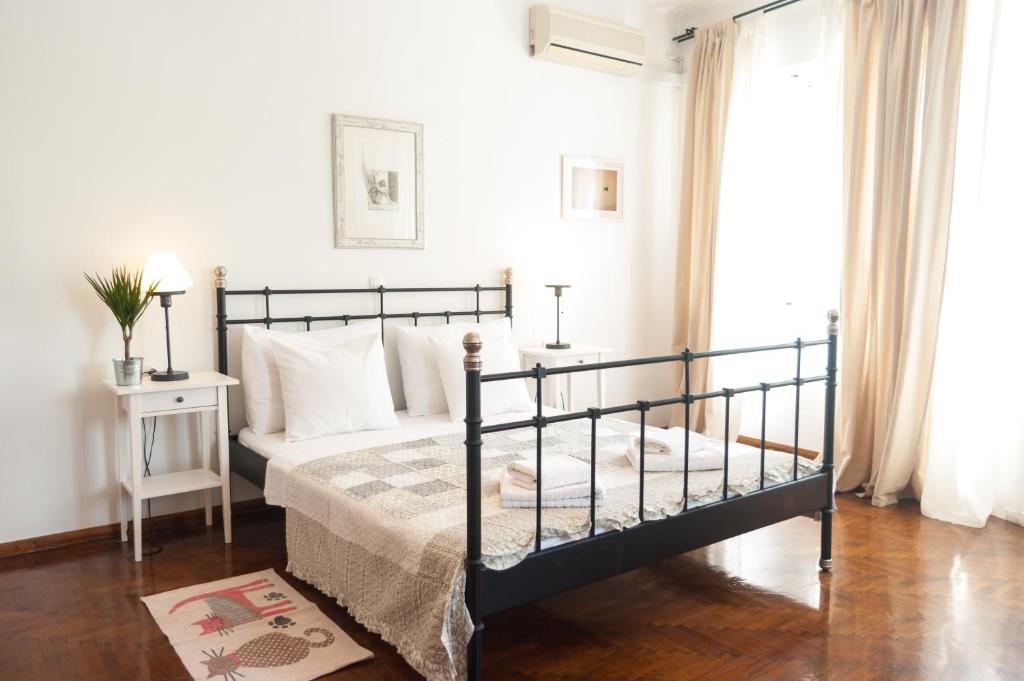 Postel nebo postele na pokoji v ubytování Indigo Inn Rooms