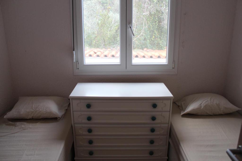 A bed or beds in a room at Sea View Villa by Agora