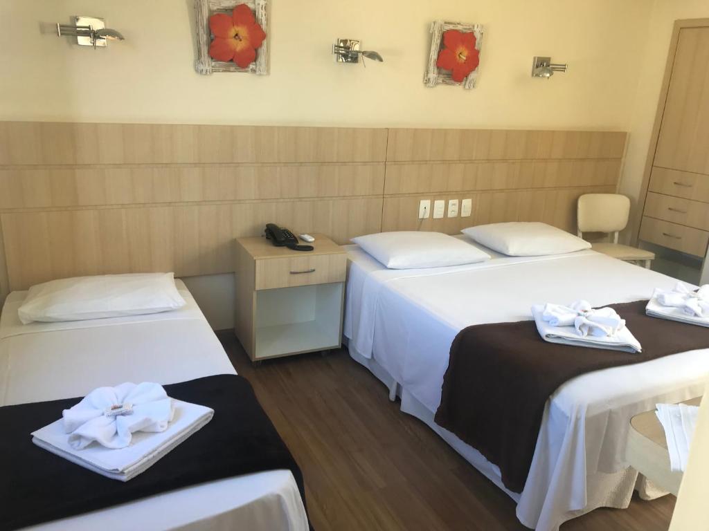 Cama ou camas em um quarto em Palace Hotel