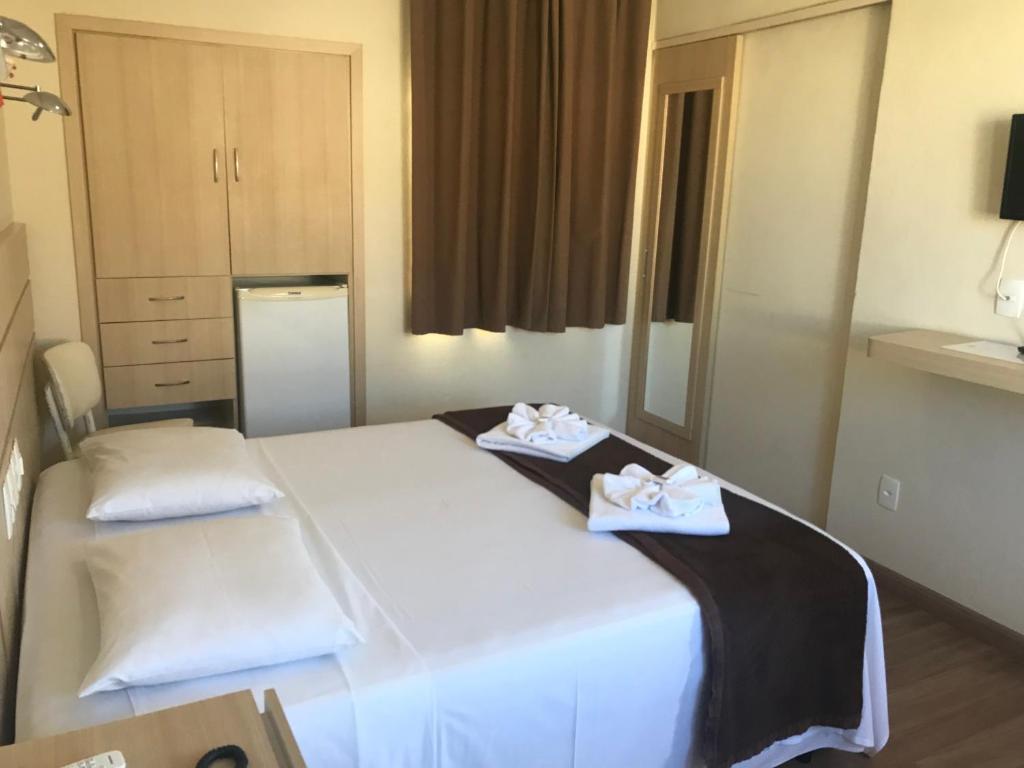 Cama ou camas em um quarto em Palace Hotel