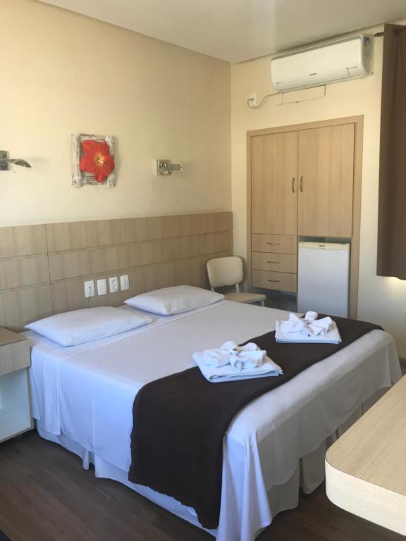 Cama ou camas em um quarto em Palace Hotel