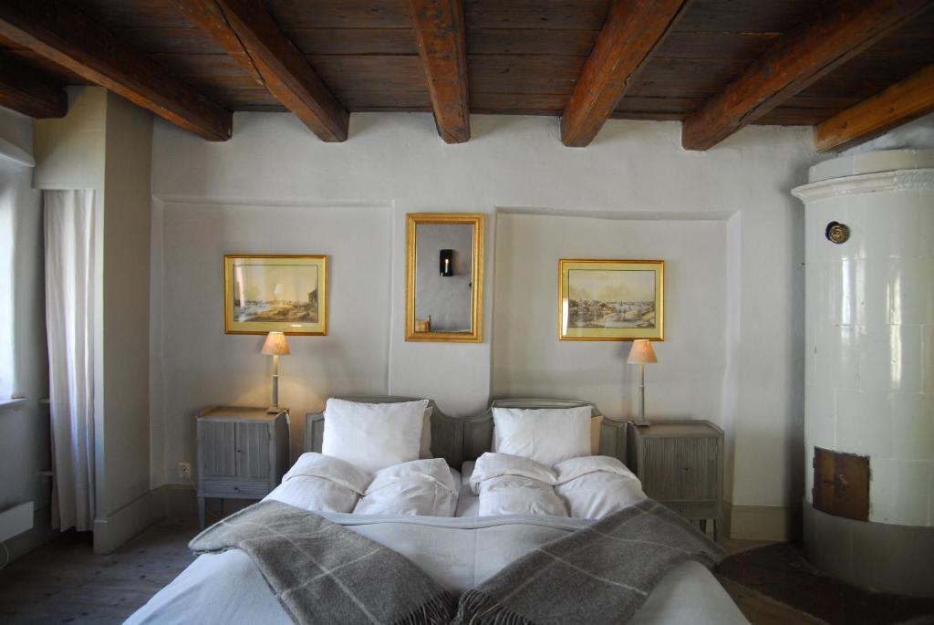 Postel nebo postele na pokoji v ubytování Hotel Sven Vintappare