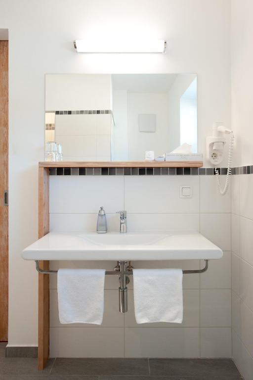 Koupelna v ubytování Hotel Vösenhuber