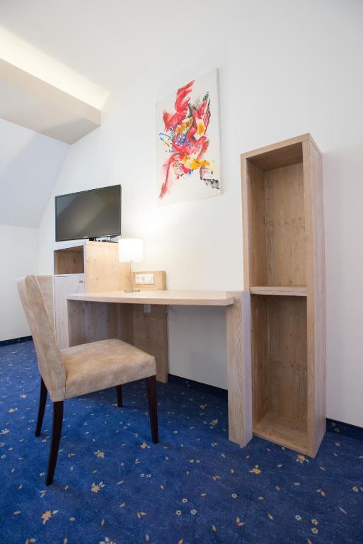 TV a/nebo společenská místnost v ubytování Hotel Vösenhuber