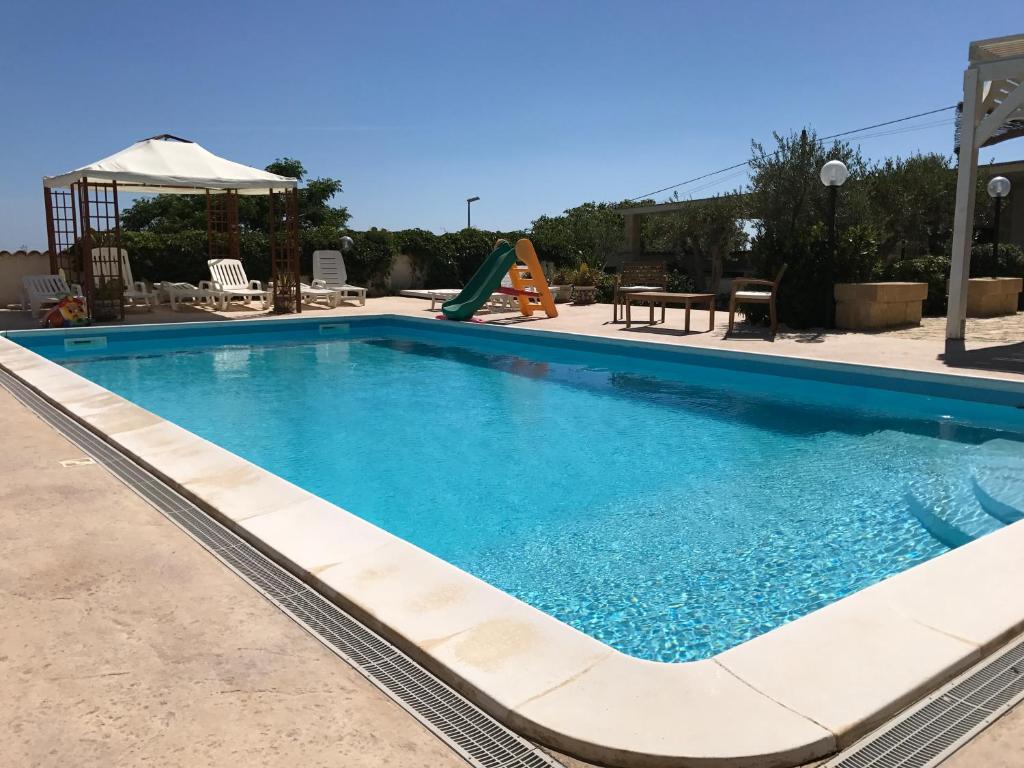 Villa Ceni - Appartamenti con camere, cucina, wc e terrazza sul mare in villa con piscina, giardino e parcheggio - ホリデーホーム
