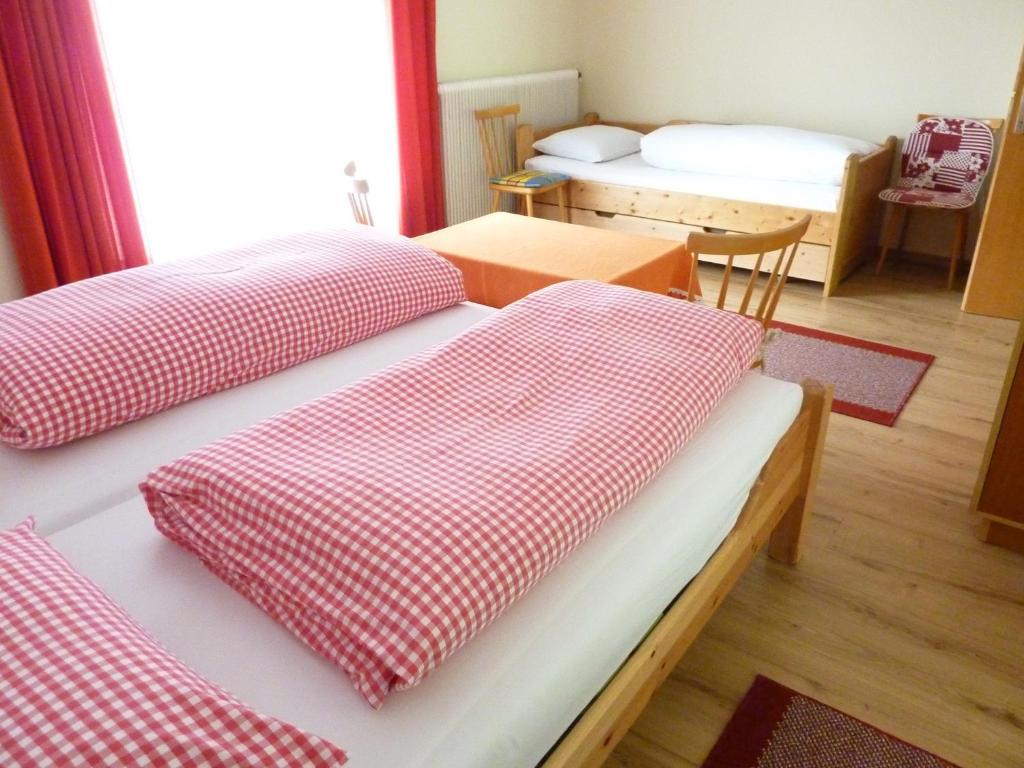 Postel nebo postele na pokoji v ubytování Haus Valentin