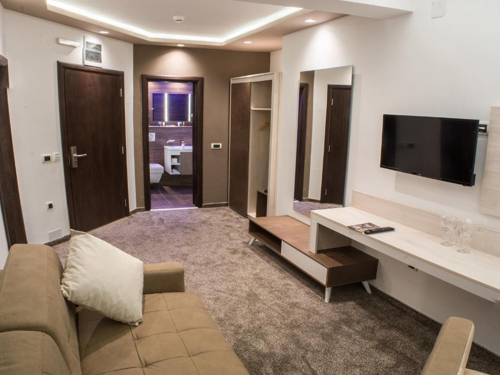 TV a/nebo společenská místnost v ubytování Hotel & Restaurant Ponte Bianco