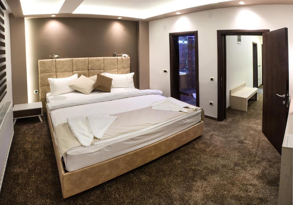 Postel nebo postele na pokoji v ubytování Hotel & Restaurant Ponte Bianco