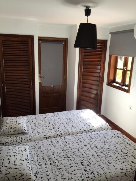 Posteľ alebo postele v izbe v ubytovaní Villa Piscine Jacuzzi Puerto Del Carmen