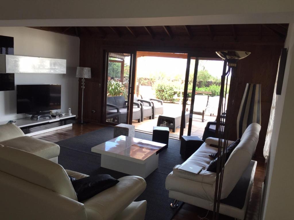 Posedenie v ubytovaní Villa Piscine Jacuzzi Puerto Del Carmen