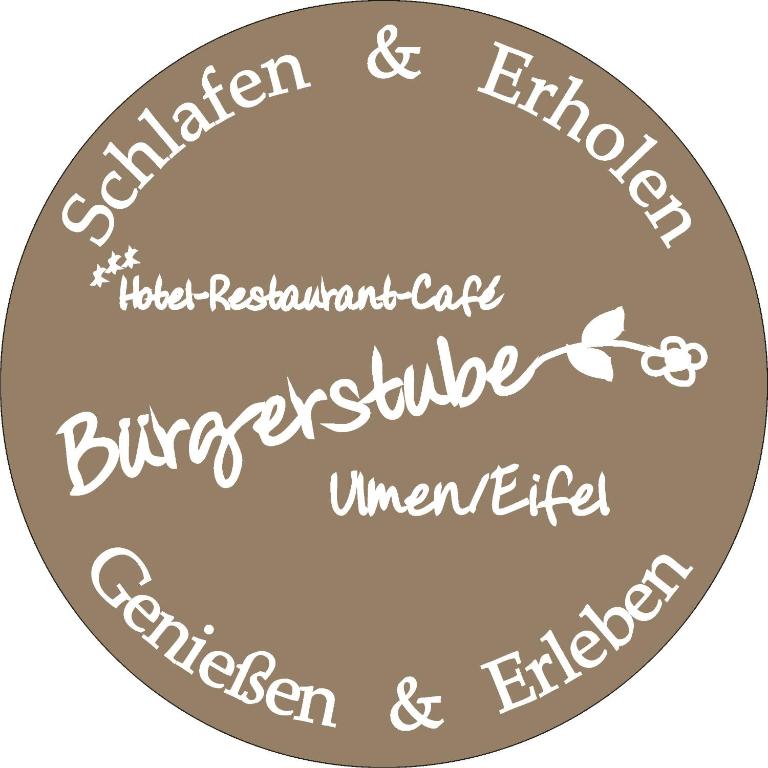 a group of calligraphy words in a circle at Hotel Restaurant Bürgerstube in Ulmen