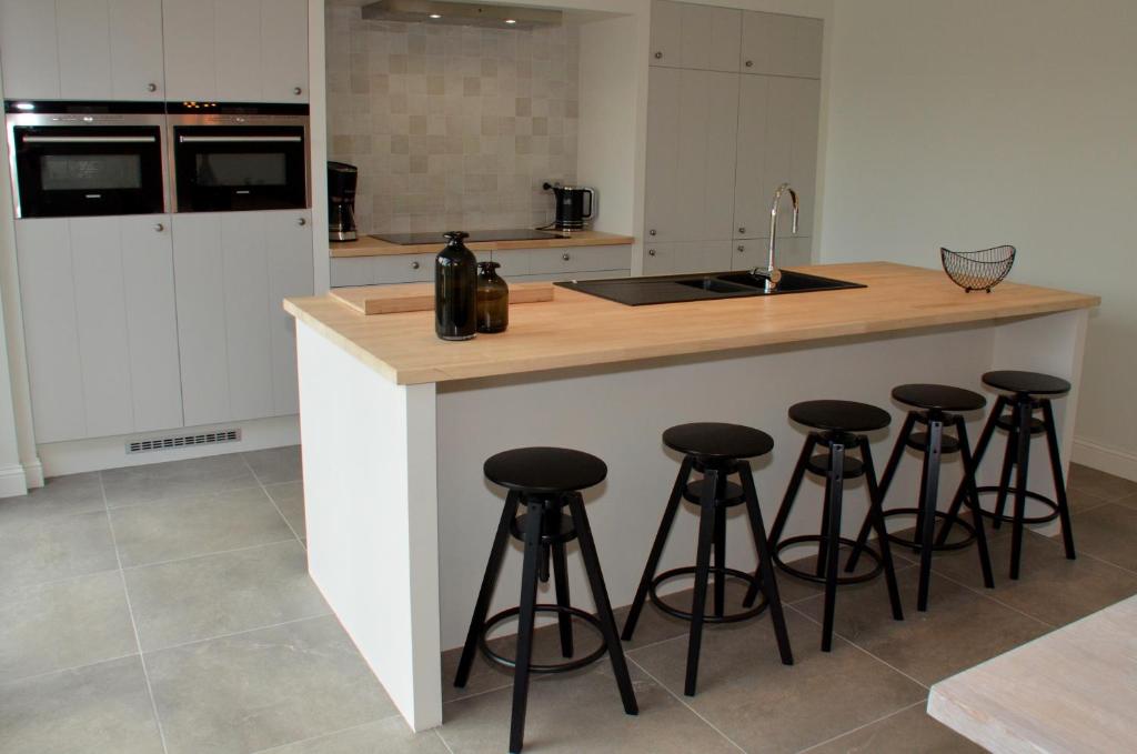 Kuchyň nebo kuchyňský kout v ubytování Vakantiewoning De Machuut
